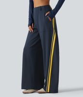 Pantalon de danse sportif taille haute pour femme, coupe élégante, blocs de couleur, rayures latérales, jambe large, poches plaquées