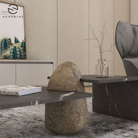 Table basse moderne en pierre avec structure métallique, mobilier de salon minimaliste au design décoratif