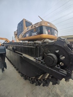 Excavatrice sur chenilles amphibie d'occasion CAT 320CL, modèle original Caterpillar 320CL, pour travaux en zone humide
