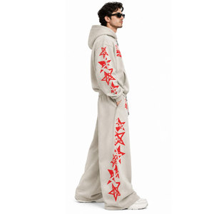 Ensemble de survêtement vintage tendance à capuche, coupe ample, style streetwear, avec sweat-shirt et pantalon imprimés étoiles rouges et poches latérales - Product Image 5