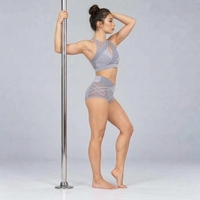 Haut d'entraînement de pole dance pour femmes, avec grip adhésif, tissu extensible confortable et respirant, ajustement sûr et mouvements corporels fluides.