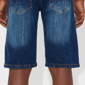 Pantalones cortos de mezclilla clásicos para niños, de color sólido, con bolsillos y logotipo, de corte recto y costuras impecables, hechos con material de alta calidad. - Product Image 4