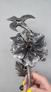 Wrought iron door handle featuring an exquisite floral design and a painted finish – a decorative accent for gates or doors. - Product Image 3
