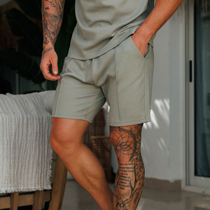 Shorts de plage décontractés pour hommes, couleur unie, avec cordon de serrage, respirants, en toile tricotée, en stock - Product Image 1