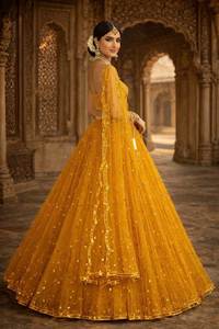 Lehenga Choli tendance et élégant en tissu filet doux, couleur jaune, avec broderies à sequins, spécial Haldi, pour mariée ou femme. - Product Image 2
