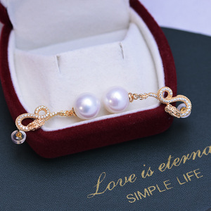 ต่างหูมุกน้ำจืดทรงกลมสีขาวขนาด 10-11 มม. ขายส่ง เงินแท้ S925 รูปหัวใจ แสงเงาสวยงาม ดีไซน์ทันสมัย - Product Image 3