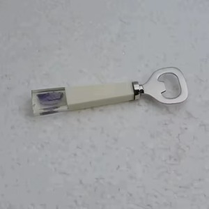 Ouvre-bouteille manuel portable transparent en acier inoxydable avec poignée blanche, design en forme de clé - Product Image 1