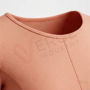 Ensemble de yoga 2 pièces pour femmes, haut court à manches longues couleur pêche et leggings taille haute sans coutures - Product Image 4