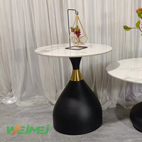 Table basse moderne et durable pour salon, table à thé ronde avec base en métal, table ronde élégante avec finition brillante