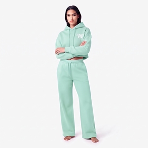 Conjunto Deportivo para Mujer en Color Verde Menta, Sudadera con Capucha y Cordón Ajustable, Puños Acanalados y Pantalones Anchos, con Logotipo Personalizado - Product Image 1