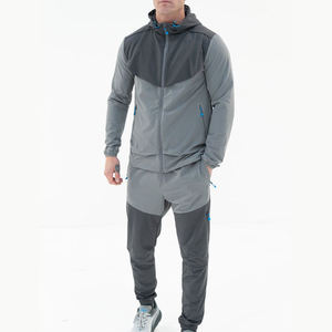 Survêtement gris pour homme avec blocs de couleur, capuche et fermeture éclair intégrale, poches latérales, coupe classique, tenue sportive d'automne - Product Image 1