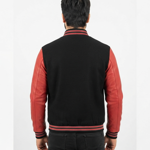Blouson universitaire noir tendance pour homme, personnalisé OEM, avec manches en cuir rouge, col montant color block, fermeture boutonnée, collection 2026 - Product Image 3