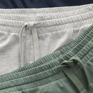 กางเกงขาสั้นผู้ชาย Homme สำหรับเล่นกีฬา ฟิตเนส วิ่ง แห้งเร็ว เป็นมิตรกับสิ่งแวดล้อม ระบายอากาศได้ดี ผลิตจากผ้าฝ้ายผสมโพลีเอสเตอร์ ทรงฮิปฮอป เอวยางยืด สีพื้น - Product Image 4