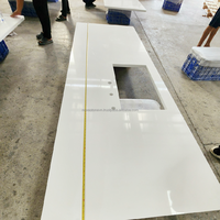 Projet résidentiel variable à résistance aux taches ornée sur mesure Maison en pierre de quartz artificiel blanc pur îlot de cuisine