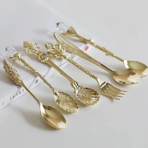 Beautiful matte gold cutlery featuring exquisite white mother of pearl mosaic <b>tiled</b> handles Available at wholesale prices - Product Image 6