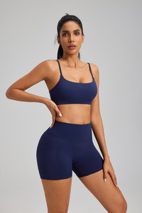 Shorts en tricot pour femmes, couleur unie, taille haute, avec poches, respirant, en spandex et nylon, coupe sportive, style classique - Product Image 2