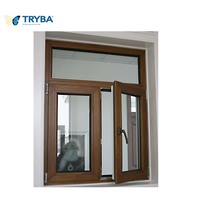 Fenêtre battante moderne en aluminium et bois à triple vitrage et structure à rupture de pont thermique, à double action et haute performance