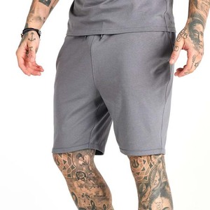 Conjuntos de camiseta y pantalones cortos de gimnasio para hombre, 100% algodón, personalizados OEM, corte ajustado, transpirables, tallas grandes, estilo informal con estampado. - Product Image 5