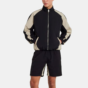 Ensemble de survêtement pour homme à blocs de couleur, manches longues, fermeture éclair, col montant, respirant, coupe régulière, style sportif, pour le printemps et les loisirs - Product Image 1