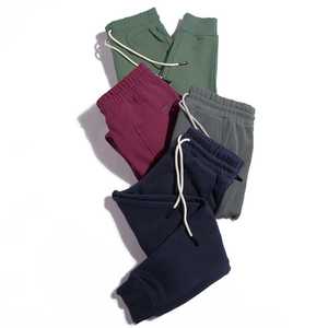 OEM <b>Men</b> Sweat Trousers Thermal Feel Brushed Fleece Loose Fit <b>Cuffed</b> Ankle Woven Patch <b>Jogger</b> Trousers Custom Clothing Factory - Product Image 4