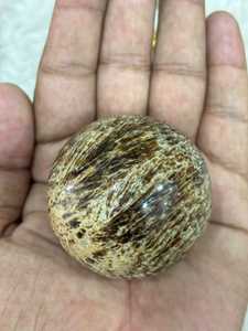 Banded aragonite <b>sphere</b> with layered mineral patterns earthy tones polished round form natural texture and distinctive - Product Image 2