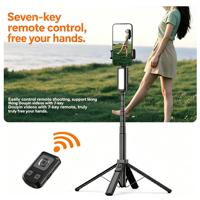 Tongkat Selfie Tripod All-in-One Kompak dengan Lampu Isi 3 Warna Terintegrasi Desain Penyimpanan Silinder Tersembunyi Portabel untuk Vlogging
