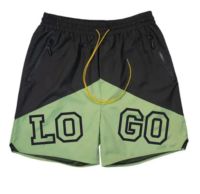 Shorts de sport pour homme en nylon bicolore, style décontracté, 100% polyester, pour la gym et la course à pied