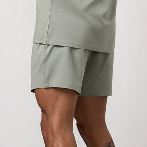 Shorts de plage décontractés pour hommes, couleur unie, imperméables, avec cordon de serrage, respirants, en toile tricotée, taille mi-haute, en stock - Product Image 2