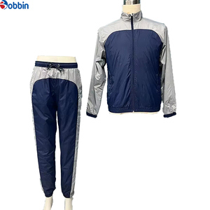 Conjunto Deportivo Personalizado para Hombre, Estilo Jogger, Color Azul Marino y Gris, Bloques de Color, Manga Larga, Cuello Alto, Cortavientos, Unisex - Product Image 3