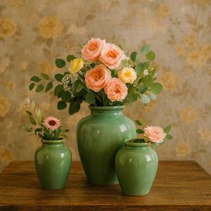 Vase d'appoint en céramique chic avec glaçure mouchetée couleur sauge douce, forme moderne arrondie, idéal pour la décoration élégante des étagères et des tables - Product Image 3