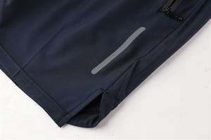 Shorts de sport pour homme à séchage rapide, taille mi-haute avec cordon de serrage, poches zippées, couleur unie, coupe Bermuda, vêtements de sport - Product Image 5