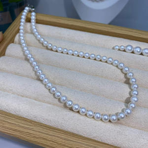 Collier de perles d'eau douce naturelles de haute qualité 6-7 mm Blanc froid Lumière Presque parfaitement circulaire avec de légères imperfections Sans noyau - Product Image 2