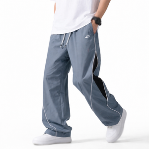 Pantalon de survêtement pour homme 100 % nylon, grande taille, avec cordon de serrage, coupe ample, respirant, empiècements latéraux, style streetwear, impression personnalisée OEM - Product Image 1