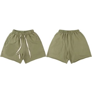 กางเกงขาสั้นทรงหลวมสบายๆ สำหรับผู้ชายผู้หญิง พร้อมหมุดย้ำด้านข้าง เอวยางยืด ดีไซน์เชือกผูก สตรีทแวร์ แฟชั่น กางเกงขาสั้นฤดูร้อน - Product Image 2