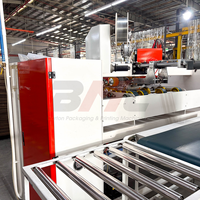 Machine semi-automatique de fabrication de boîtes en une seule pièce pour la fabrication de boîtes en carton ondulé