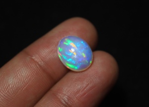 Ópalo etíope natural Welo de 13*10.5*5 mm, cabujón plano, ópalo multicolor de 3.90 quilates, corte ovalado, gema suelta lisa para joyería. - Product Image 3