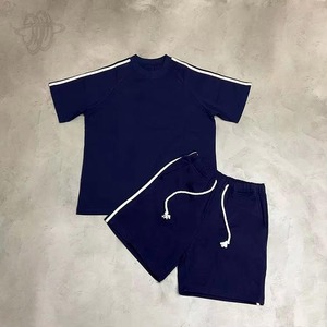 Conjunto Deportivo Unisex Azul Marino 100% Poliéster Transpirable y Ligero, Camiseta de Manga Corta con Cuello Redondo y Pantalones Cortos con Cordón Ajustable - Product Image 1