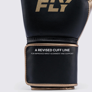 Gants de boxe et de sparring robustes en cuir véritable noir et or pour le kickboxing et le Muay Thai, personnalisables avec logo - Product Image 1