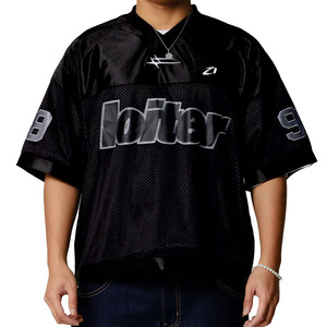 เสื้อเจอร์ซีย์อเมริกันฟุตบอลทรงหลวมแบบตาข่าย OEM สไตล์สตรีทแวร์โอเวอร์ไซส์ สีดำ สำหรับทีมกีฬา รับผลิตเสื้อผ้าพร้อมโลโก้ตามสั่ง - Product Image 1