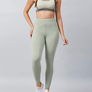 Leggings de yoga taille haute sans couture, longueur intégrale, couleur unie, avec bande latérale contrastante, en Spandex et Nylon, extensibles dans les quatre sens, pour le sport - Product Image 1
