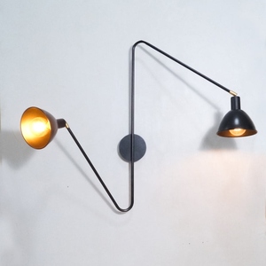 Modern dual arm <b>wall</b> <b>sconce</b> with a sculptural black metal frame and two adjustable cone shades Its asymmetrical silhouette adds - Product Image 1