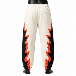 Pantalones Deportivos Anchos para Hombre, Color Negro con Estampado Lateral Naranja, Corte Holgado, Cintura Elástica, Estilo Casual Urbano - Product Image 2