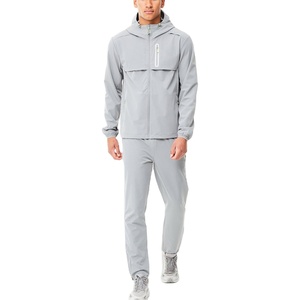 Conjunto de chándal deportivo personalizado para hombre, chaqueta cortavientos, puño ajustable, manga estampada, chándal tejido para hombre 2026 - Product Image 1