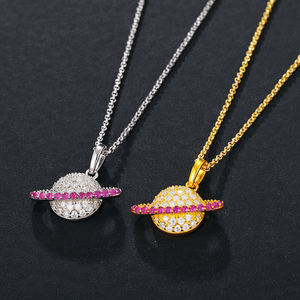 Colgante de planeta con incrustaciones de circonita, chapado en oro y plata, joyería moderna para regalo unisex. - Product Image 1