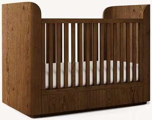 Collection Parfaite : Lit Bébé Moderne en Bois Massif avec Literie Douce Pastel et Jouet Éléphant en Peluche sur Matelas pour Enfants - Product Image 1