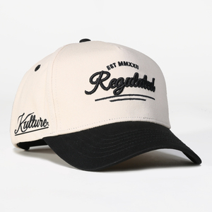 Gorra de Béisbol Unisex de 6 Paneles Huzu Enterprises con Logotipo de Dibujos Animados Bordado, Ajustable con Cierre a Presión, Color Crema y Negro, de Algodón Satinado con Ojales - Product Image 4