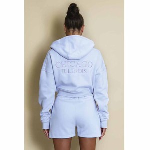 Conjunto de dos piezas de forro polar con capucha azul claro para mujer, conjunto informal de pantalones cortos, ropa holgada para primavera y verano - Product Image 4