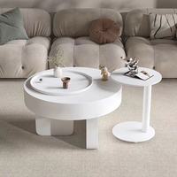 Table basse ronde noire minimaliste moderne avec compartiment de rangement et extension pivotante pour salon, hôtel, appartement