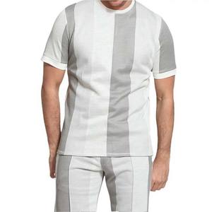 ชุดเซ็ตเสื้อยืดและกางเกงขาสั้นผ้าฝ้าย 100% สำหรับผู้ชาย ลายตัดสี 2 ชิ้น เหมาะสำหรับฤดูร้อน - Product Image 4