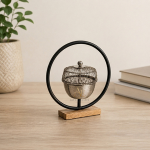 Brûleur d'encens élégant en métal rond avec base en bois, design artistique unique, parfait pour une touche de parfum luxueux dans la décoration intérieure. - Product Image 1